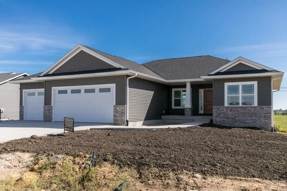 2769 Foxtail Lane custom home in Palo Iowa with three car garage